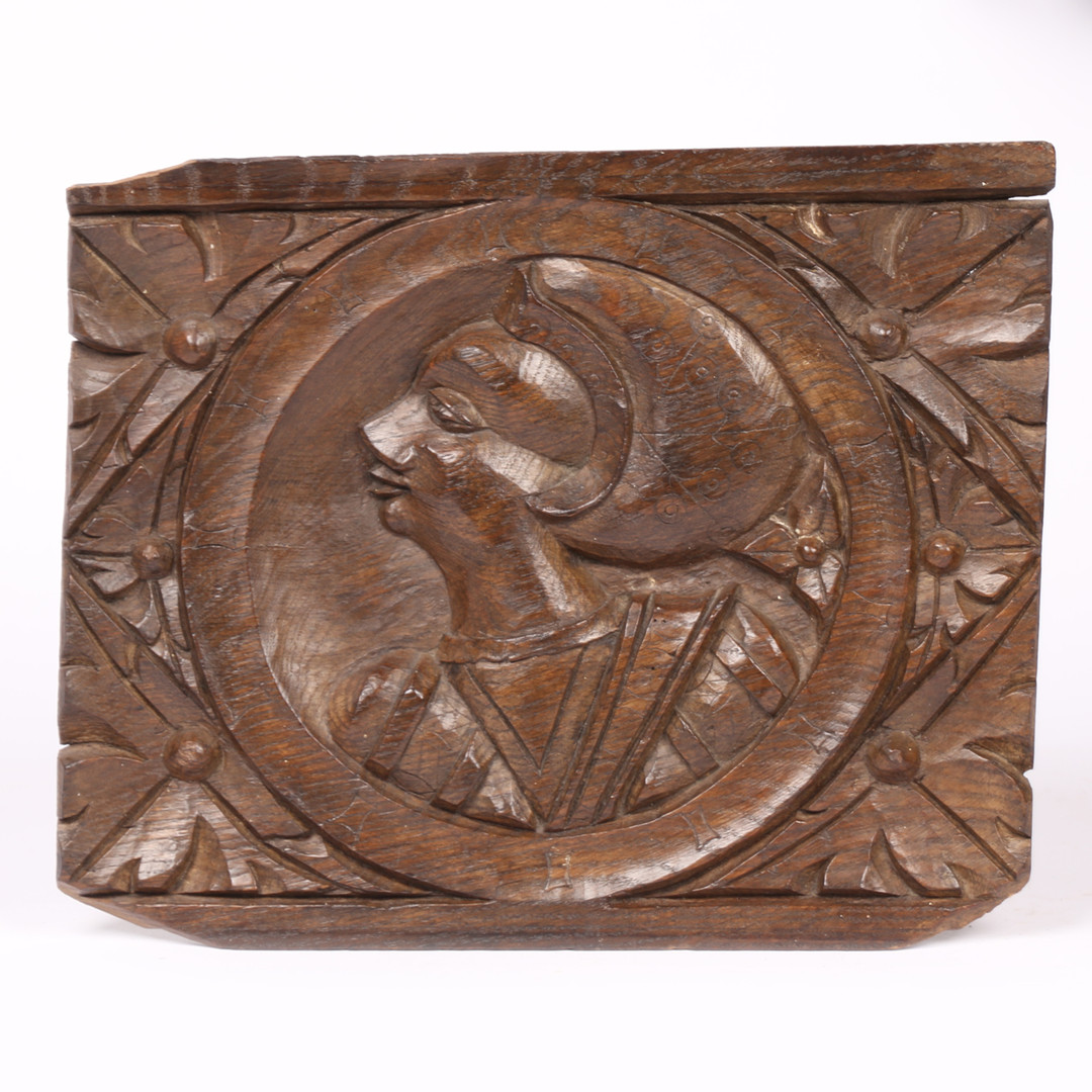 A GOOD HENRY VIII OAK ROMAYNE-TYPE CARVED PANEL, CIRCA 1540.