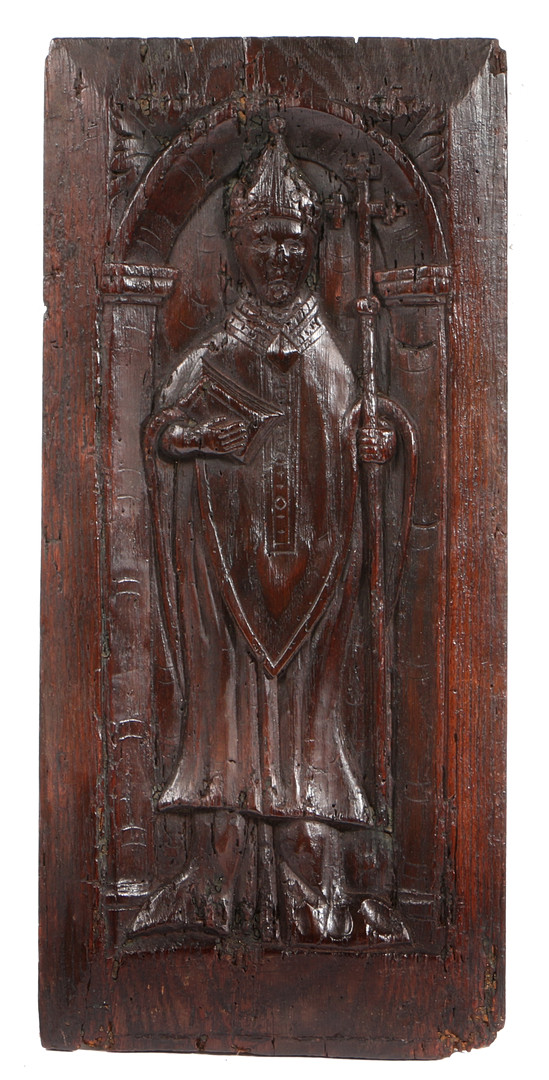 A 16TH CENTURY CARVED OAK PANEL, CIRCA 1540-80.