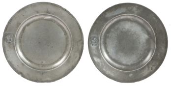 A PAIR OF GEORGE II PEWTER PLAIN RIM PLATES, CIRCA 1730-50.