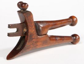 A GEORGE III YEW CROSSOVER LEVER-ACTION NUTCRACKER, POSSIBLY DATED '78'.