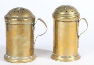 TWO GEORGE III BRASS SHAKERS OR MUFFINEERS, CIRCA 1780.