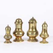 A GROUP OF FOUR GEORGE III CAST BRASS CASTERS OR PEPPERETTES, CIRCA 1780-1800.