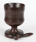 A SMALL 18TH CENTURY LIGNUM VITAE STANDING MORTAR AND PESTLE, (2).
