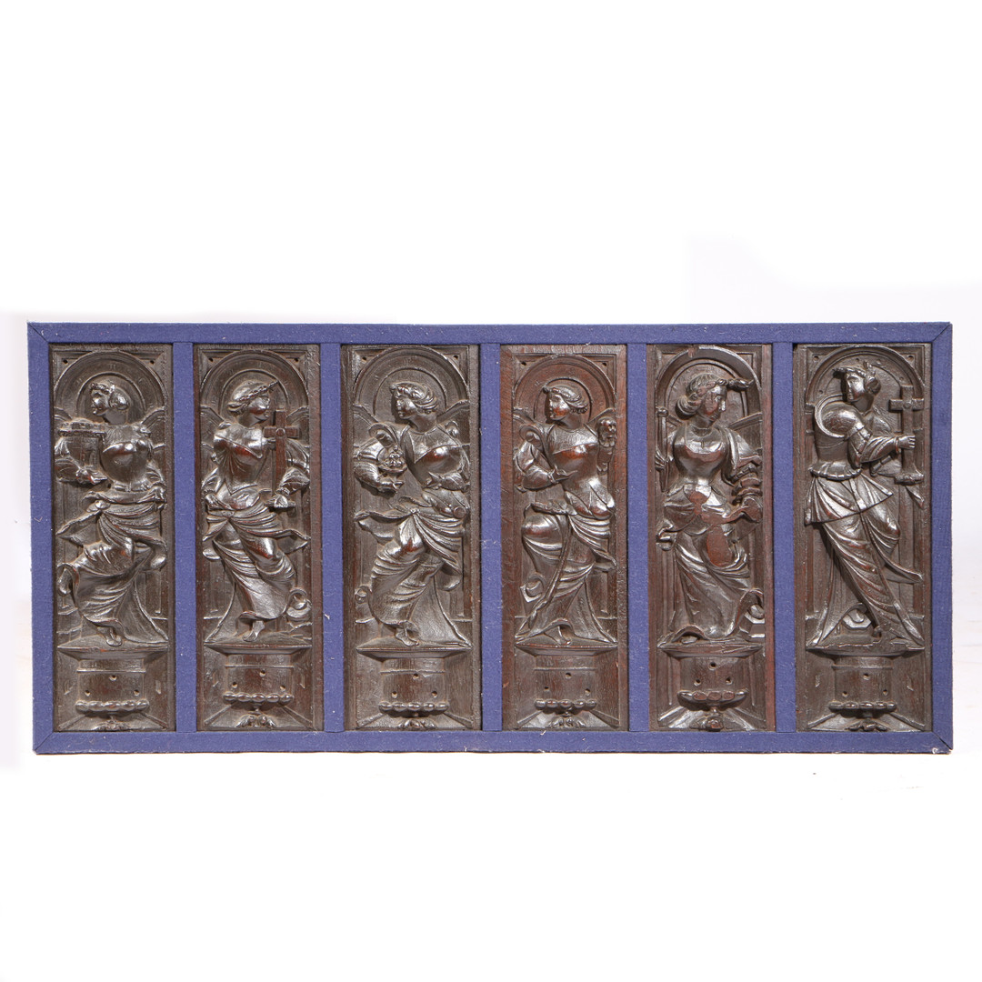 A SET OF SIX MID-16TH CENTURY CARVED OAK FIGURAL PANELS, FRAMED, CIRCA 1550.