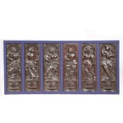 A SET OF SIX MID-16TH CENTURY CARVED OAK FIGURAL PANELS, FRAMED, CIRCA 1550.