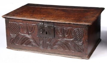 A CHARLES II OAK BOARDED BOX, NORTH COUNTRY, CIRCA 1670.