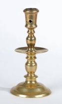 A SMALL MID-17TH CENTURY BRASS HEEMSKERK CANDLESTICK, DUTCH, CIRCA 1650.