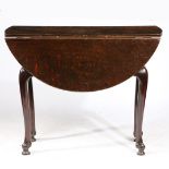 AN UNUSUAL GEORGE I OAK DROP-LEAF OCCASIONAL TABLE, WITH RARE CLOVEN-HOOF FEET, CIRCA 1720.