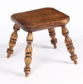 A SMALL EARLY 19TH CENTURY ELM STOOL, ENGLISH/WELSH, CIRCA 1820-40.
