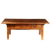 A FRUITWOOD FARMHOUSE TABLE, REDUCED IN HEIGHT TO FORM A COFFEE TABLE, CIRCA 1800.