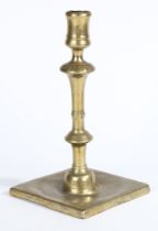 A GEORGE II BRASS SOCKET CANDLESTICK, CIRCA 1740.