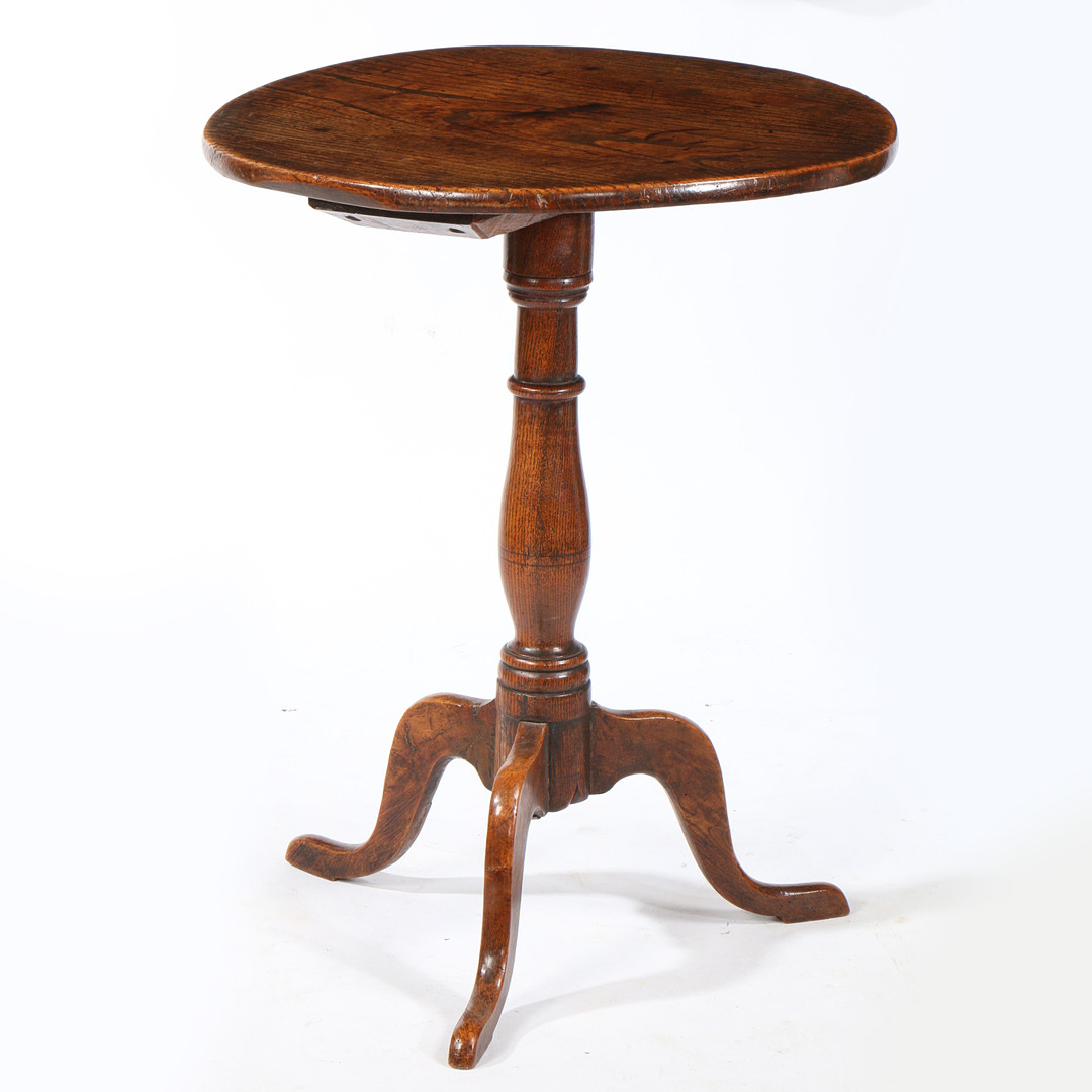 A GEORGE III ELM AND ASH TRIPOD OCCASIONAL TABLE, WITH A ONE-PIECE WELL-FIGURED TOP, CIRCA 1790.