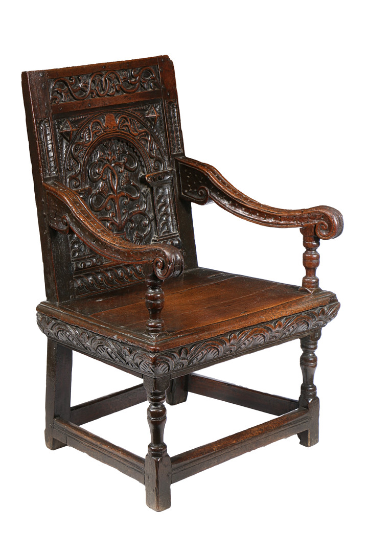 A GOOD AND RARE ELIZABETH I OAK OPEN ARMCHAIR, CIRCA 1570.