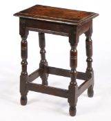 A PARTICULARLY TALL CHARLES I OAK JOINT STOOL, CIRCA 1640.