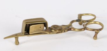 A GEORGE III BRASS CANDLE-SNUFFER, CIRCA 1800.