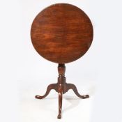 A GEORGE III OAK TRIPOD OCCASIONAL TABLE, WITH ONE-PIECE TOP, CIRCA 1780.