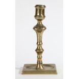 A GEORGE II BRASS SOCKET CANDLESTICK, CIRCA 1740.