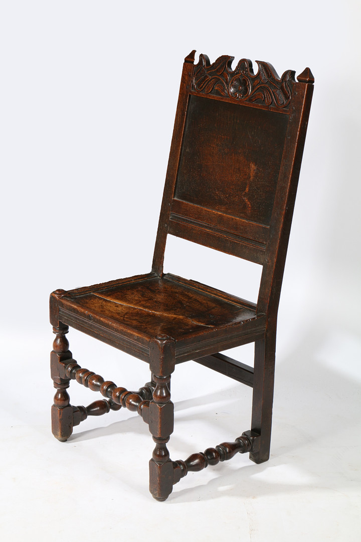 A CHARLES II OAK BACKSTOOL, LANCASHIRE, CIRCA 1670.