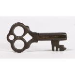 A SMALL 14TH CENTURY BRONZE-ALLOY KEY, CIRCA 1300-1400.