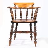 A 19TH CENTURY ELM AND ASH SMOKERS' BOW ARMCHAIR.