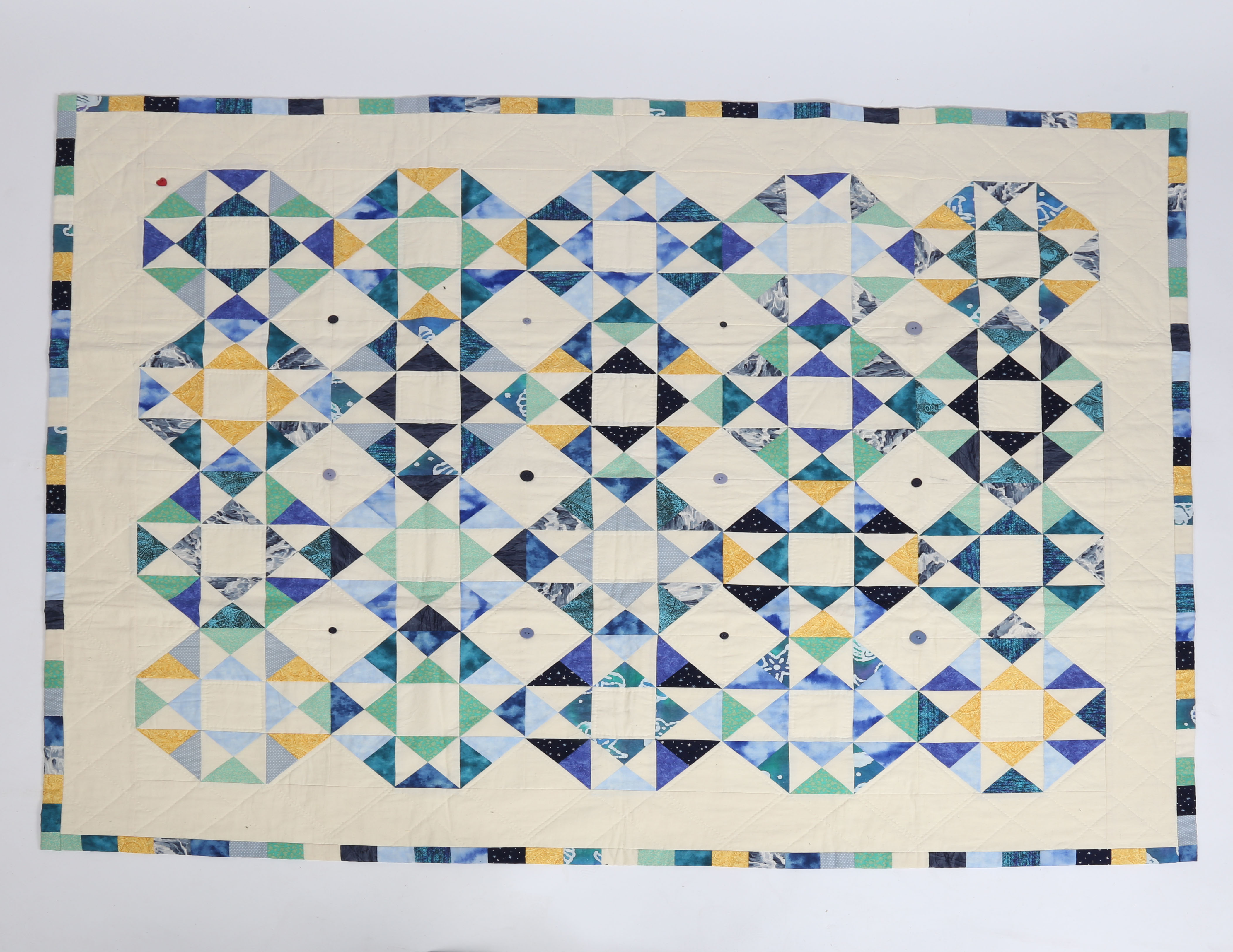 A STUNNING BLUE HANDMADE PATCH WORK QUILT