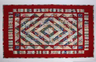 A BEAUTIFUL PATCH WORK SINGLE QUILT
