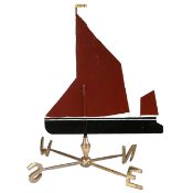 A POLYCHROME PAINTED AND BRASS WEATHER VANE MODELLED AS A SAILING BARGE.