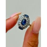 Antique Art Deco Cabochon Sapphire and Diamond Cluster Ring in Platinum