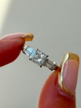 Outstanding Princess Cut Diamond Engagement Ring with Double Diamond Baguette Shoulders 18ct White G