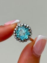 Large 6.05 Aquamarine and Diamond Halo Ring in Yellow Gold