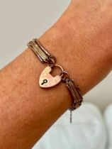 Boxed 9ct Gold Bracelet with Lovers Knot Detailing and a Heart Padlock