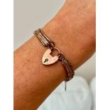 Boxed 9ct Gold Bracelet with Lovers Knot Detailing and a Heart Padlock