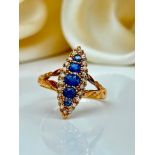 Wonderful Gold Sapphire and Diamond Navette Ring