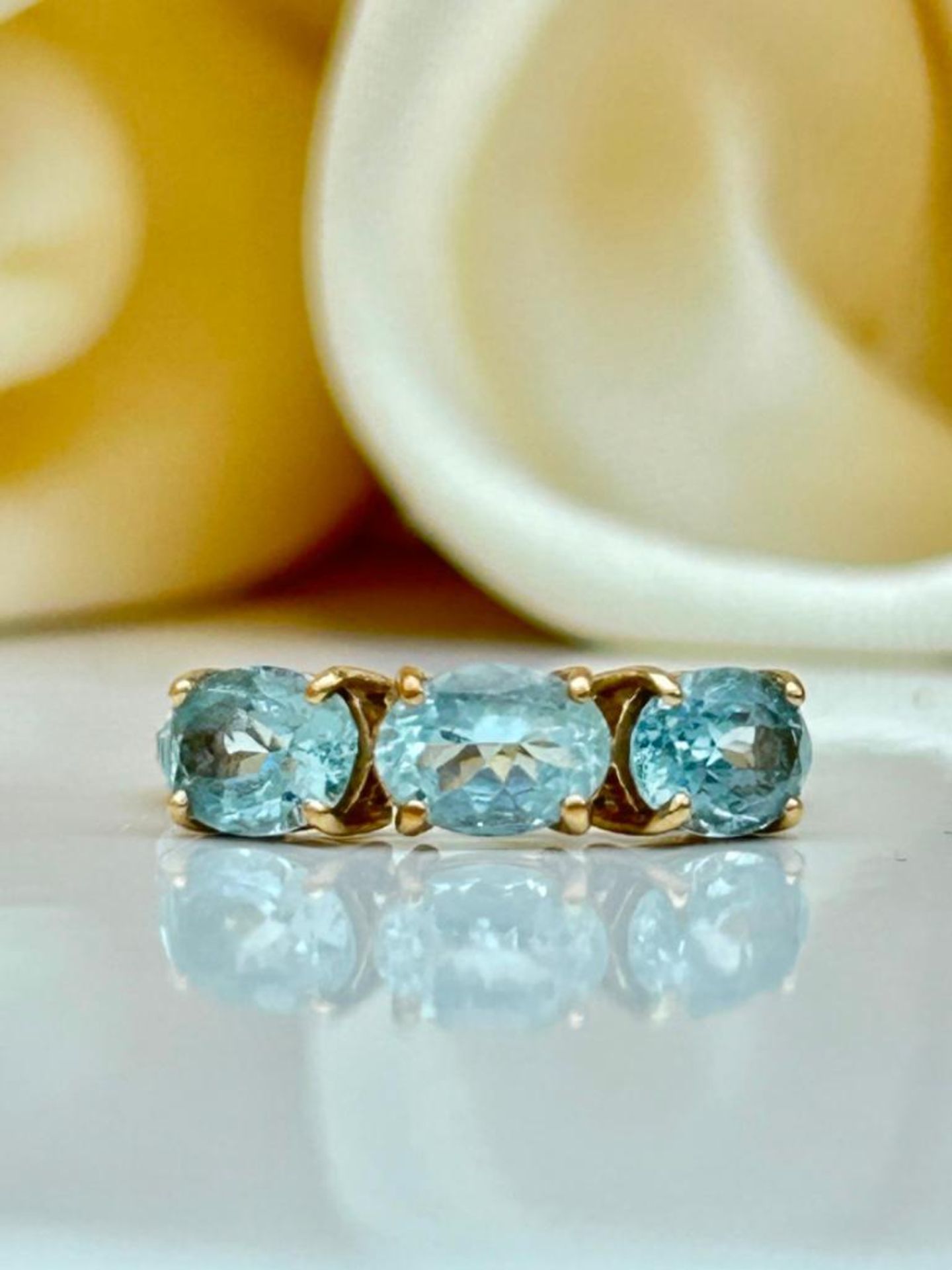 Sweet Aquamarine 3 Stone Ring with Diamond Shoulders in Gold