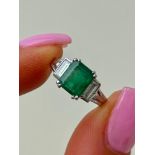 Outstanding Emerald and Diamond Ring in Platinum