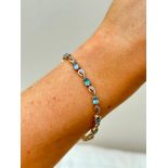 18ct Yellow Gold Aquamarine and Diamond Line Bracelet