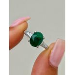 Wonderful Platinum Emerald Ring with Baguette Diamond Shoulders
