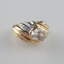 Diamantring - Gelb-/Weißgold 750/000, gestempelt, mittig besetzt mit 1 Diamanten von 1,3 ct. im Ova