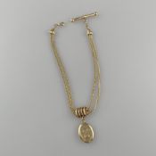 Taschenuhren-Knebelkette - 14K Gelbgold (585/000), mit ovalem Medaillonanhänger aus Schaumgold, L. 