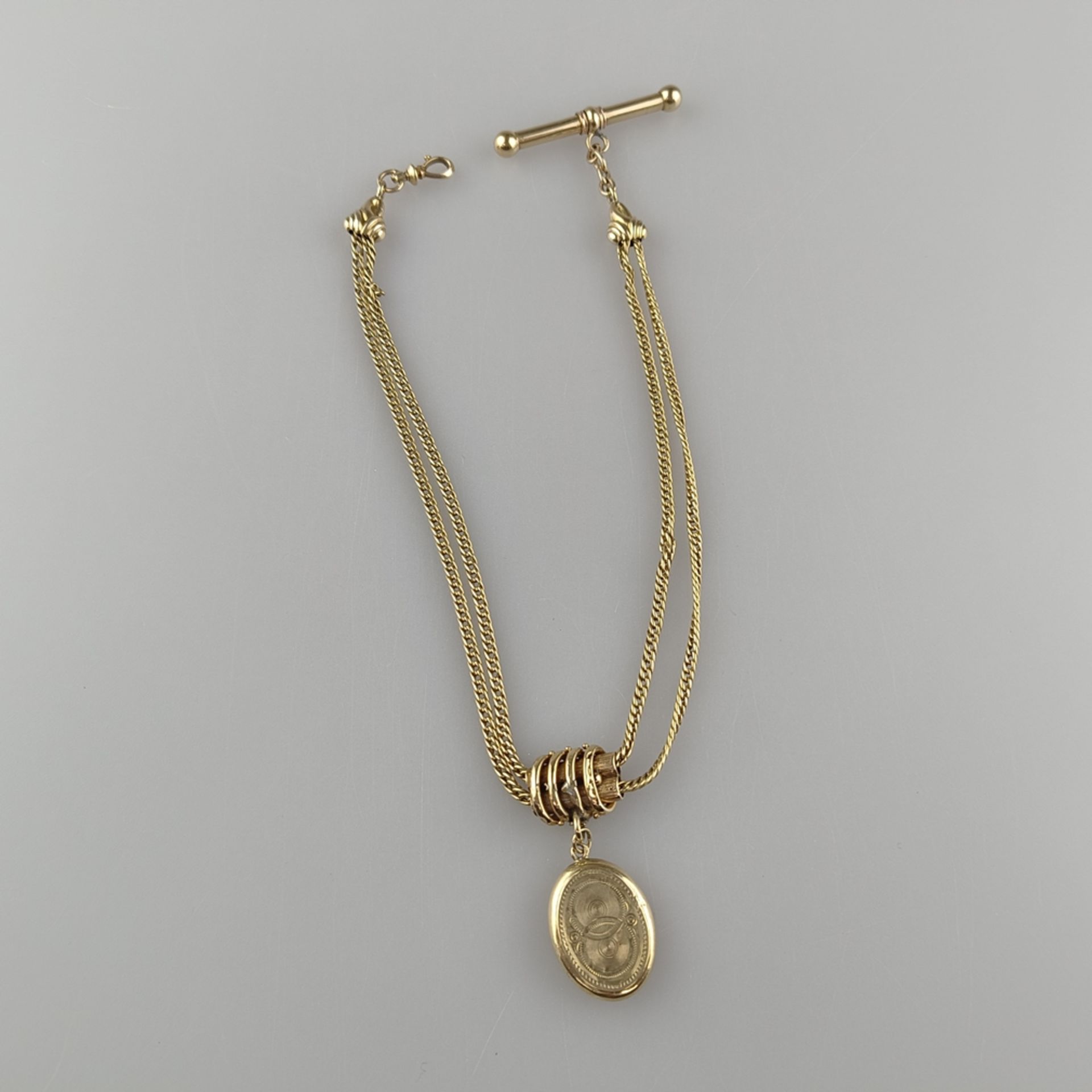 Taschenuhren-Knebelkette - 14K Gelbgold (585/000), mit ovalem Medaillonanhänger aus Schaumgold, L.