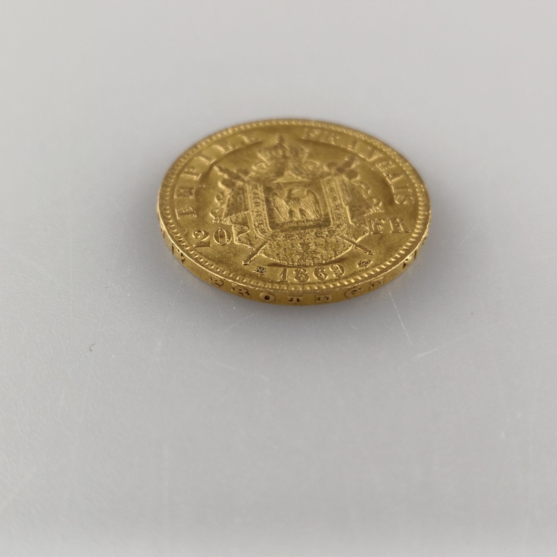 Goldmünze 20 Francs 1867 - Frankreich, Napoleon III Empereur, 900/000 Gold, Entwurf: Barre, Prägema - Image 3 of 3