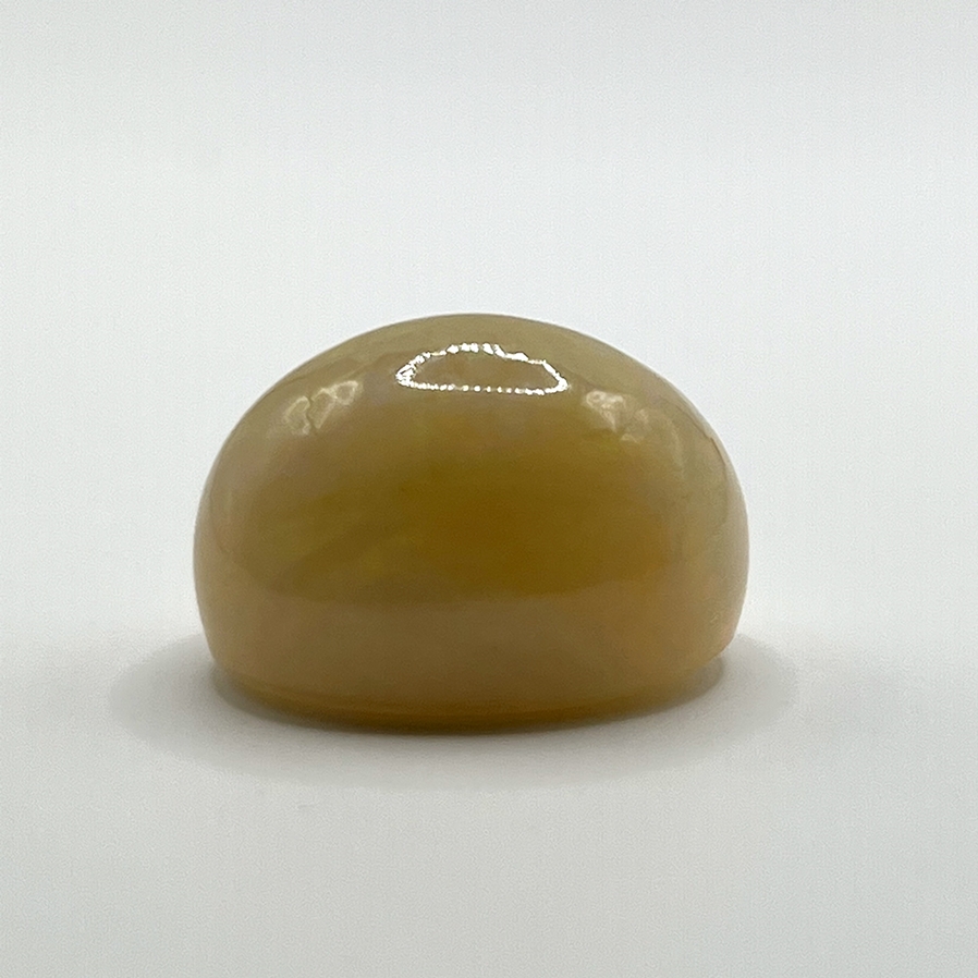 Loser Opal - 25,38 ct., gelb mit Farbenspiel, ovaler Cabochon, Details siehe Zertifikat "ITGLR", Nr