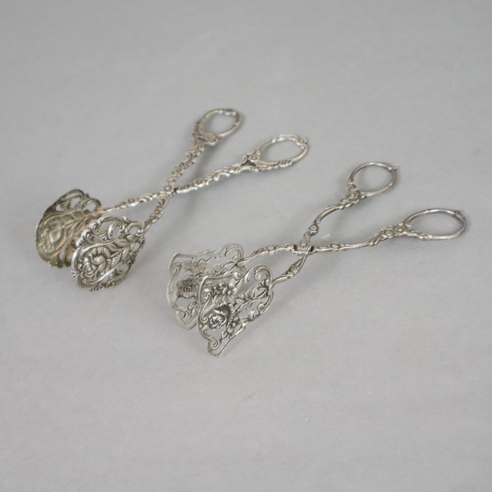 Zwei Gebäckzangen "Hildesheimer Rose" - 800/835er Silber, gestempelt, verschiedene Formen, beide üp
