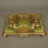 Jugendstil-Schreibtischgarnitur - um 1900/10, geschwungenes Bronzegestell mit Seerosen-Reliefdekor,