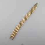 Vintage-Armband - NAPIER / USA, goldfarbenes Metall, glanzpoliert, Flechtband von 16mm-Breite, am V