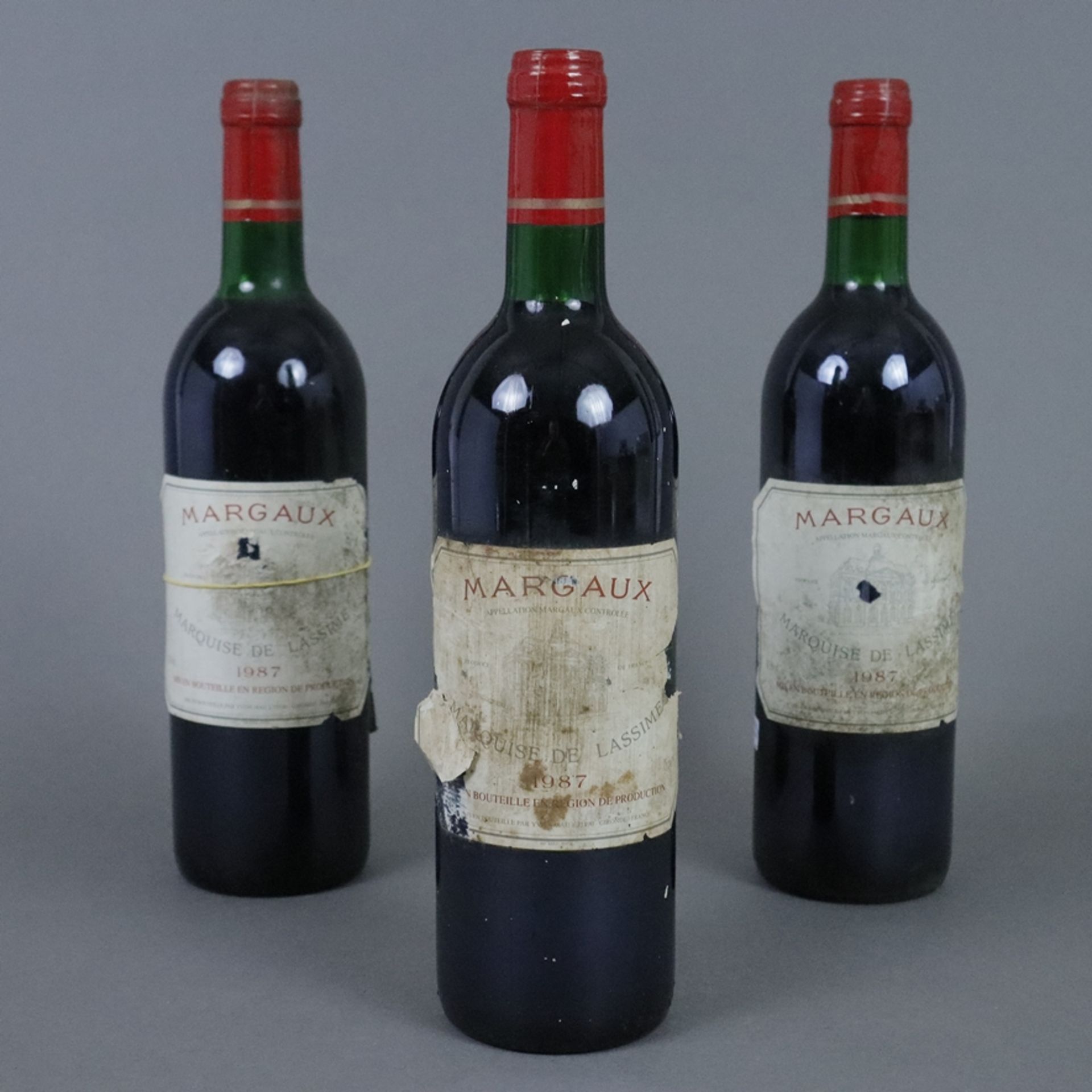 Weinkonvolut - 3 Flaschen 1987 Margaux, Marquise de Lassime, France, 75 cl, Füllstand: Top Shoulder
