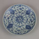 Small plate - China, Qing Dynasty, floral decor in underglaze cobalt blue painting, on the undersid