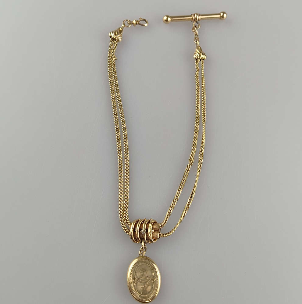 Taschenuhren-Knebelkette - 14K Gelbgold (585/000), mit ovalem Medaillonanhänger aus Gold, L. 31 cm,