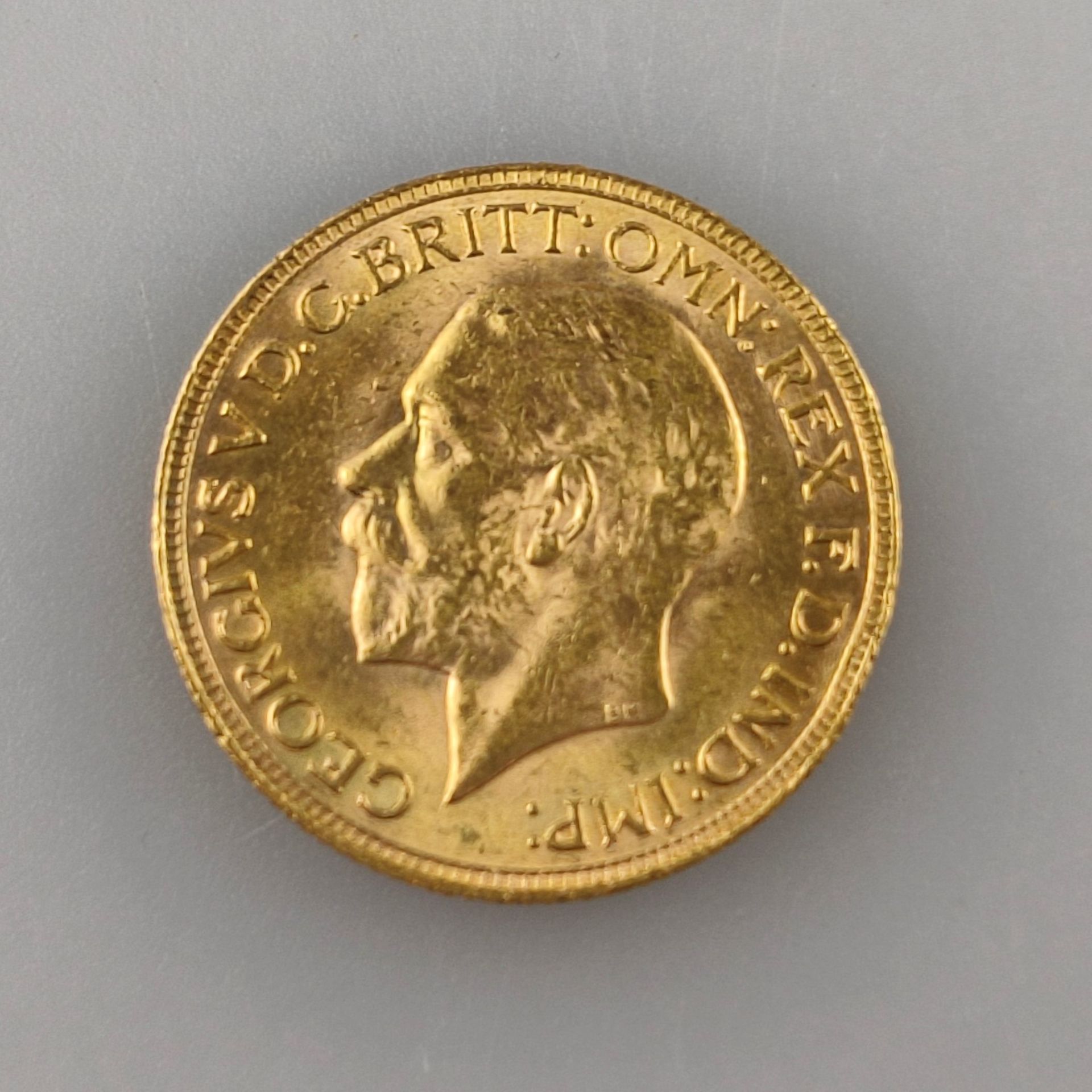 Goldmünze Sovereign 1931 - Großbritannien, George V., Revers: Hl. Georg als Drachentöter, gestempel