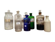 SHELF LOT OF OLD CHEMIST BOTTLES